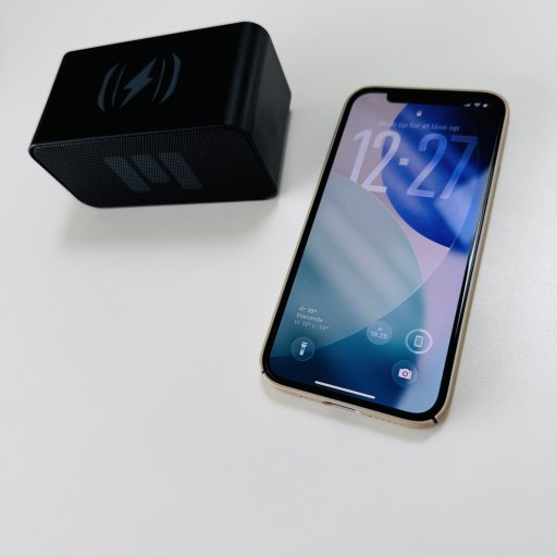 CHARGE & PLAY MINI II – Kompakt højttaler og trådløs oplader i ét smart design