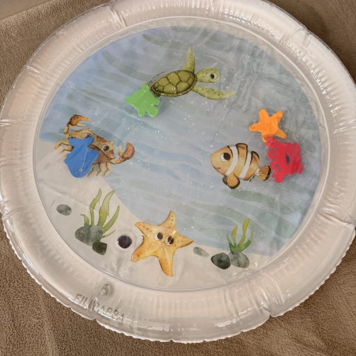 Smil, udvikling og babyglæde på tæppet