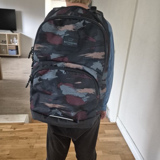 En overskuelig og robust skoletaske, der kan følge barnet gennem flere år på mellemtrinnet